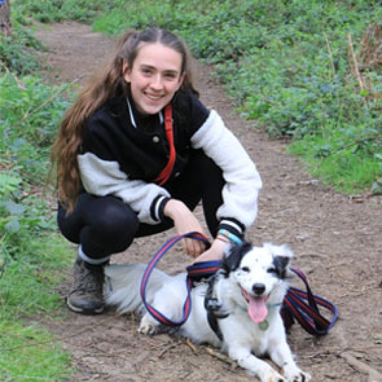 Amy Challis, owner of AC Dog Academy with her dog on a lead