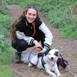 Amy Challis, owner of AC Dog Academy with her dog on a lead